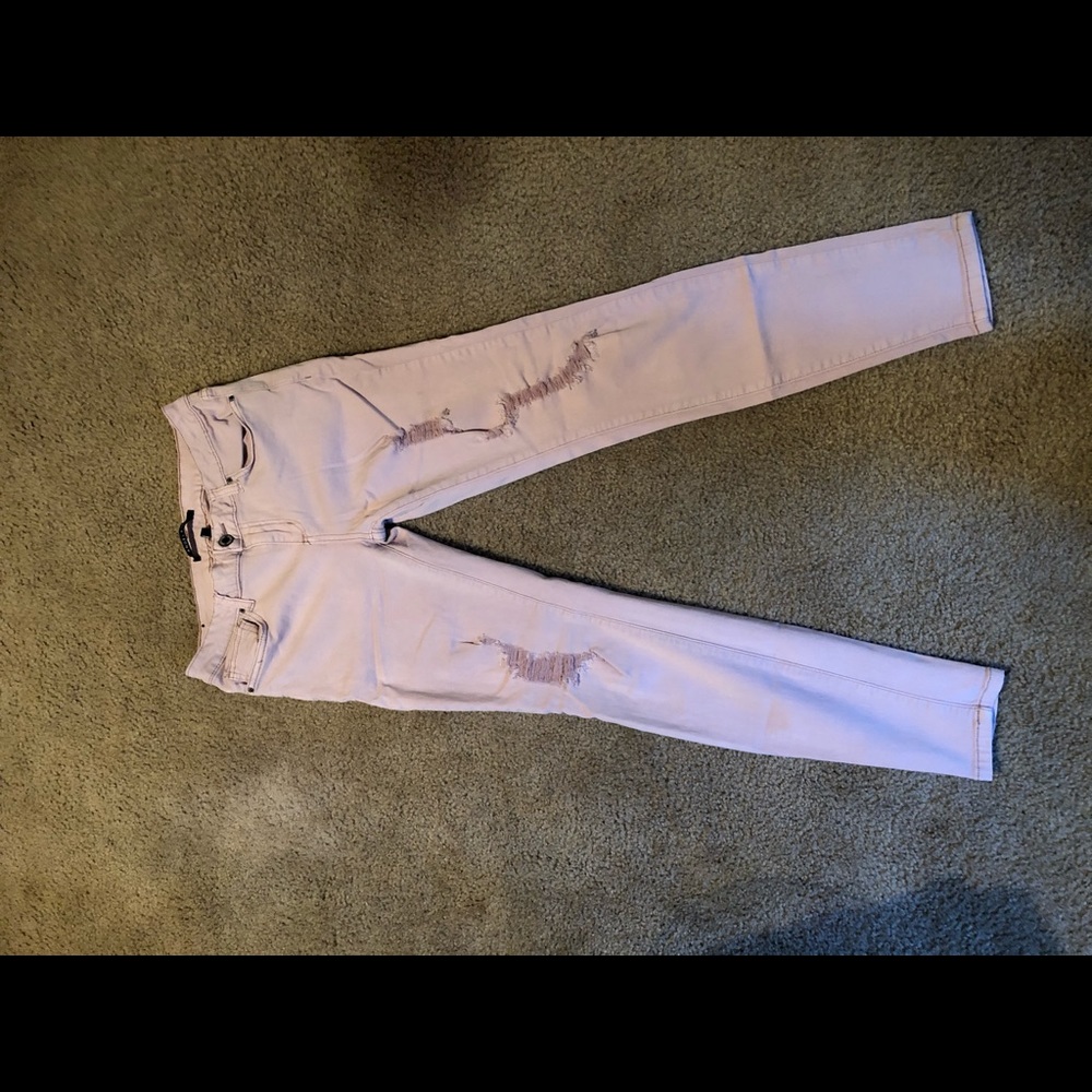 light pink jeans ripped